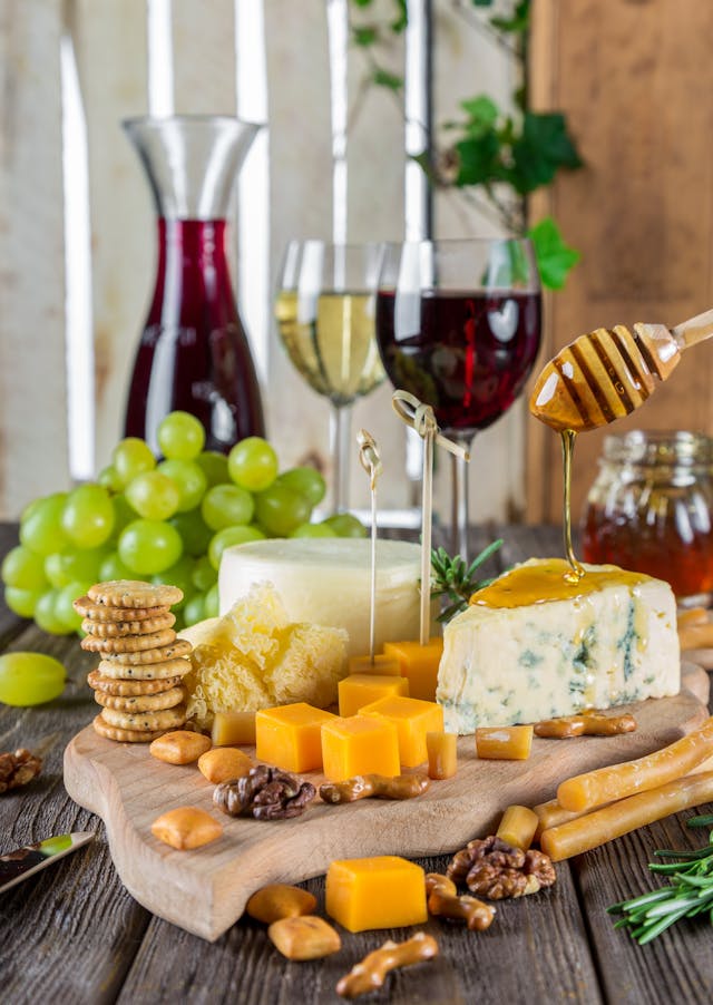 wine and cheese on board